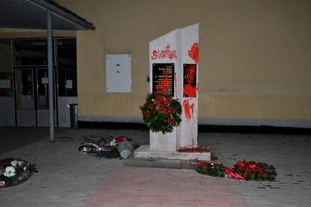 Artists spraying communist leader's bust tried