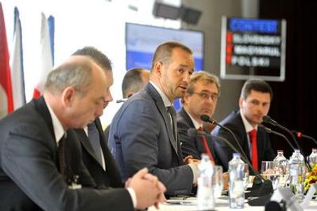 R-L: Sprava: Head of Multi-laterla Cooperation at Slovak Transport Ministry Róbert Mojsej, Polish chargé d´affaires in Slovakia Piotr Samerek, Slovak Transport Ministry's state secretary Viktor Stromček, and head of the railway section of the Slovak ministry Jiří Kubáček talk integrated cross-border city transport.