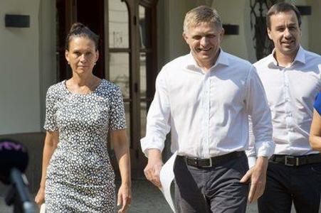 PM Fico (Centre) and his wife Svetlana react to accusations. 