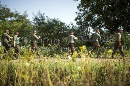 Slovakia selects refugees while sending police to assist in Hungary