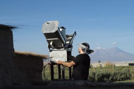 Jaroslav Šimon sets the AMOS system at the Paniri Caur observatory in Chiu-Chiu, Chile. 