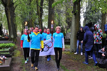 Slovak Olympic athletes Mrtikán (l) and Hrivnák-Klocová lit the Olympic torch to start a relay Rio 2016. 