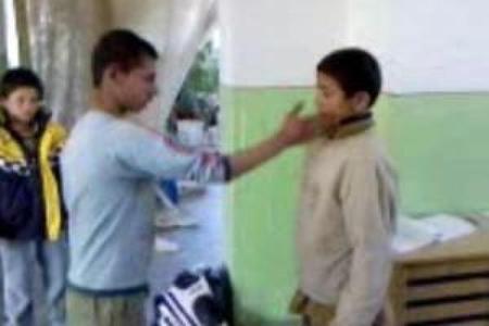 Roma boys at Košice police station, a still made from a video.