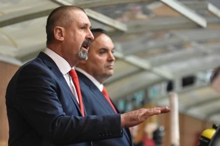 Coach Zdeno Cíger (L) during hockey match Slovakia-Denmark on April 28. 
