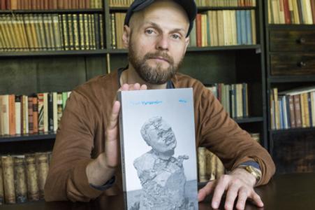 Ivan vyrypaev poses with a translation of his five dramas, at the New DRama 2016 festival. 