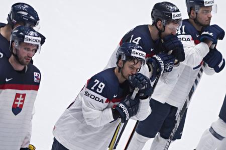 Sad Slovak hockey players after losing to Belarus.