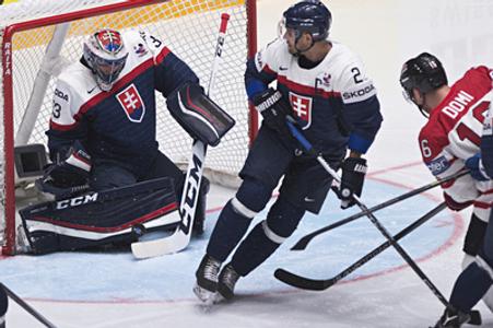 L-R: Slovaks goalie Július Hudáček, Andrej Sekera and Canadian Max Domi in Saturday match of the B Group in St Petersburg. 