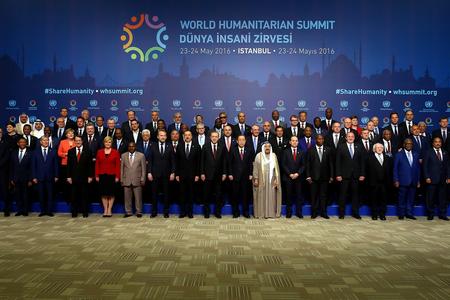 A group of world leaders and representatives pose for a photograph at the World Humanitarian Summit in Istanbul. President Kiska is the fifth from the right in the second row from below.