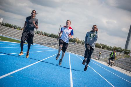 l-r: US sprinter Joe Morris, Slovak athlete Ján Volko, US sprinter Arthur Delaney