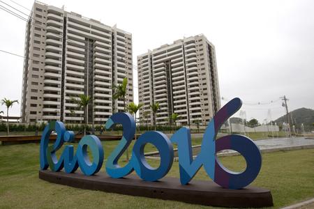 The Rio 2016 sign stands in front of the Olympic Village in Rio de Janeiro, Brazil.