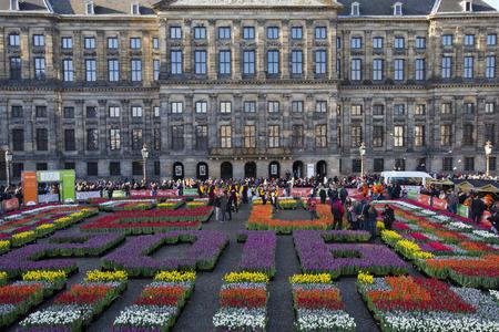 Crates with tulips in a pattern reading EU 2016 laid out on Dam Square to mark the Dutch six-month EU presidency on the fifth national "tulip day' in Amsterdam.