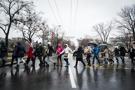 Teachers on strike form human chains