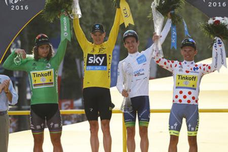 R-L: Best mountain racer Rafal Majka (Poland, Tinkoff team), Briton Adam Yates (Orica team) the best under 25; Briton Chris Froome (Sky team), best overall, and Peter Sagan (Tinkoff) as the best sprinter at the end of 103rd Tour de France.