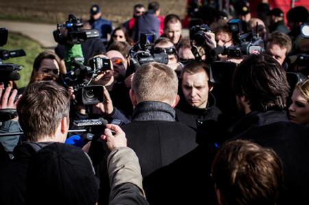 PM Fico surrounded by journalists