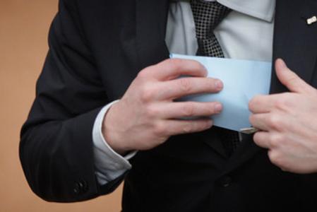 Illustrative stock photo: hiding a ballot