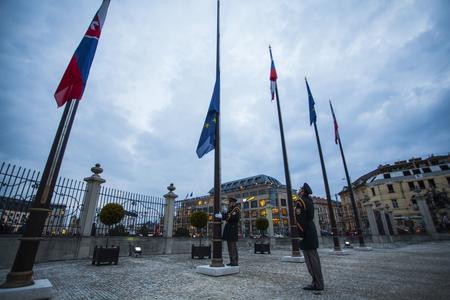 Flags in front of the Presidential Palace fly at half-mast.