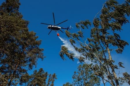 Forest fire at Záhorie is being tamed also by helicopter. 