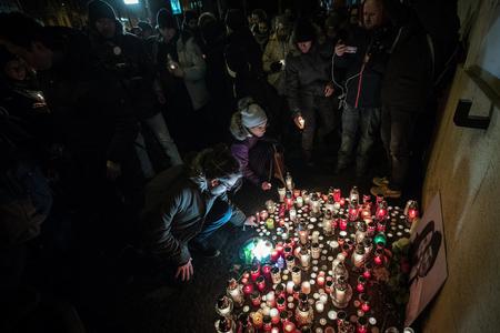 People came out to the SNP Square in Bratislava in the freezing evening of February 26 to light candles in the memory of investigative reporter Ján Kuciak and his partner Martina Kušnírová, who were murdered.
