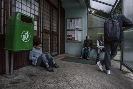 Desperate foreigners continue to deal with queues at the police department