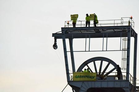Greenpeace activists protest coal mining