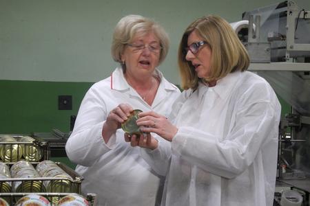 Agriculture Minister Gabriela Matečná (R) checks the products in Tatrakon food cans producer, illustrative stock photo