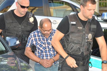 Police escort Igor T. 