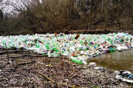 The Bodva river is clogged with bottles