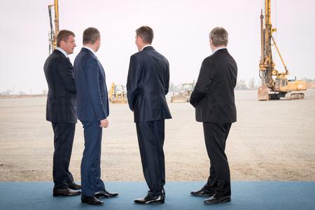 Representatives of the Slovak cabinet and the investor watching the building site of teh new logistics centre of Volkswagen Slovakia.  