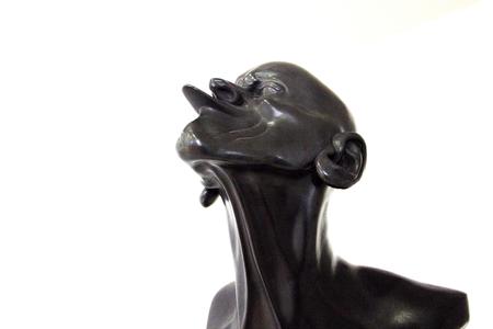 A replica of one head from the series Character Heads by F. X. Messerschmidt; ownership of the Slovak National Gallery