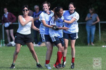 Members of the Slovak Shamrocks celebrate on the field.