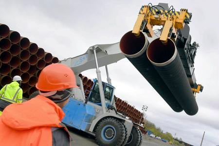 Steel pipes for the North Stream 2 pipeline are uploaded in Mukran harbour in Sassnitz, Germany.