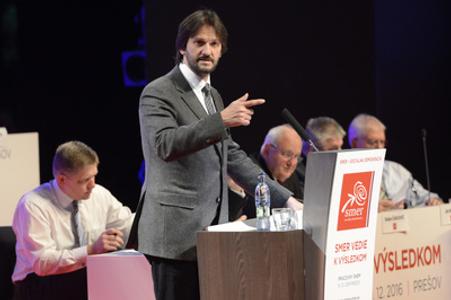 Interior Minister Robert Kaliňák (C) held a speech at the Smer party congress on December 10. Behind him (L) is Prime Minister Robert Fico.  