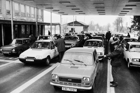 After the 1989 revolution, everyone wnated to travel to the West, which caused long queues. 