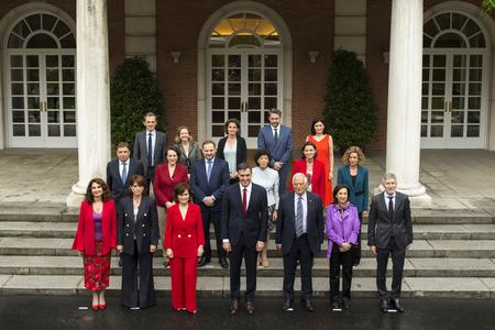 Spain's new government ministers pose for the media after their first cabinet meeting on June 8, 2018.