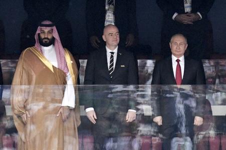 Saudi Arabia Crown Prince Mohammed bin Salman, FIFA President Gianni Infantino and Russian President Vladimir Putin (left to right) stand for the anthem prior to the match between Russia and Saudi Arabia which opened the 2018 soccer World Cup in Russia.