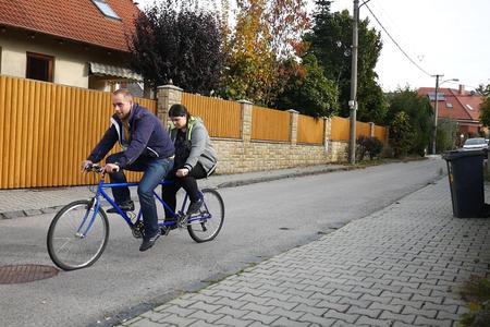 Alžbeta Poláková on tandem bicycle.