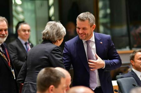 British PM Theresa May greets her Slovak counterpart Peter Pellegrini. 
