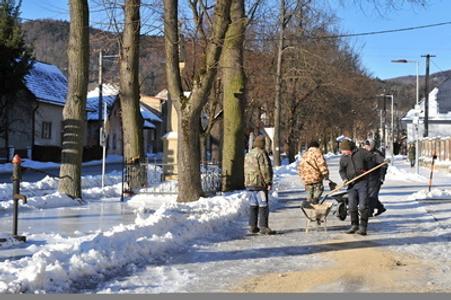 Ice and frost force people to grit and salt roads to make them safer.