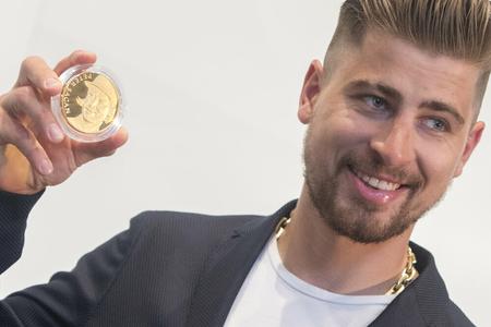 Slovak cyclist Peter Sagan promotes a commemorative medal of his success. 