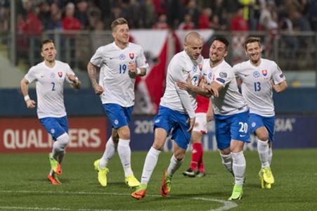 Slovak rejoice after scoring a goal in Malta, March 25. 