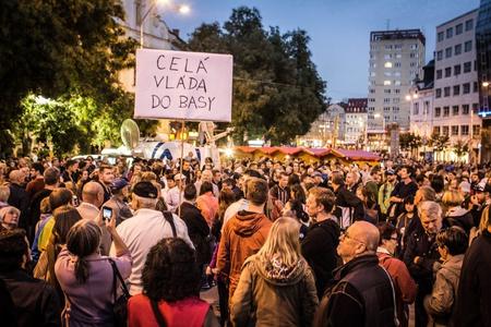 The whole government to prison, a banner in the photo reads.