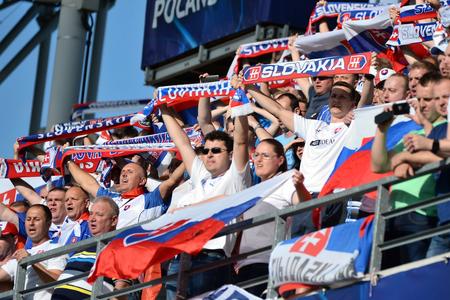 The Slovak team has visible support at tribunes.