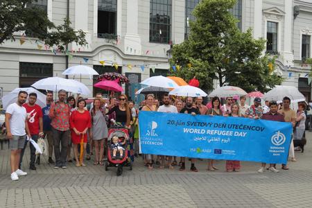 People take part in the Umbrella March in Bratislava in mid-June 2019.