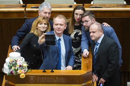 Opposition MPs brought wedding cake to parliament, session was postponed