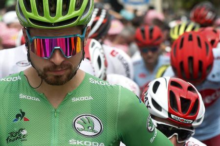 Slovakia's Peter Sagan, wearing the best sprinter's green jersey, starts the 15th stage of the Tour de France.