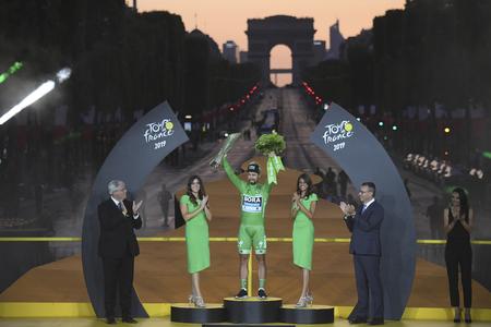 Slovakia's Peter Sagan, wearing the best sprinter's green jersey, stands on the podium after the Tour de France cycling race in Paris, France, on July 28, 2019.