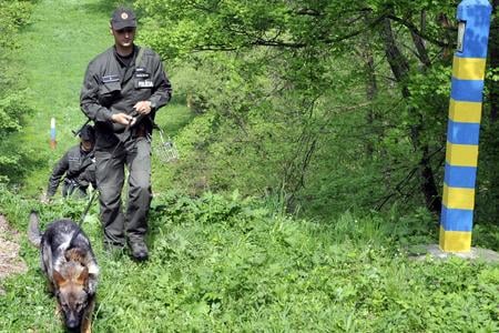 Police officers patrol a northern part of Slovakia's border with Ukraine, which is nearly 100 kilometres long. The border is also an external border of the Schengen Area. 