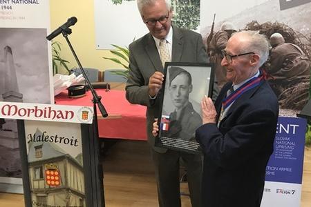 Roger Naël receives Slovak honours in the village of Malestroit in 2017. 