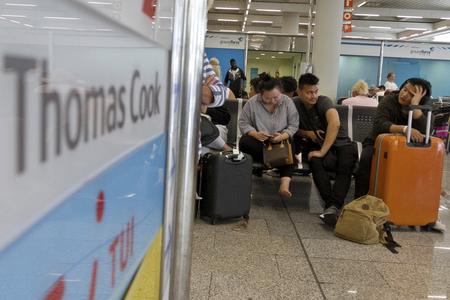 British passengers wait for news on cancelled Thomas Cook flights at Palma de Mallorca airport on Monday September 23