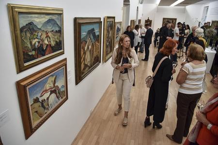 People attend the Martin Benka exhibition at the SOGA auction company in Bratislava on September 10, 2019